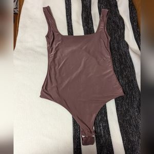 Pretty Little Things size 2 purple bodysuit